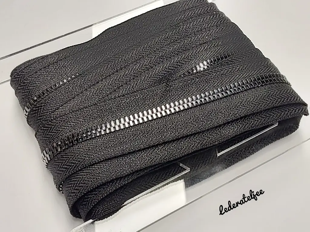 Metalen rits op rol met Gun Metal tandjes 5mm (geen YKK) 
