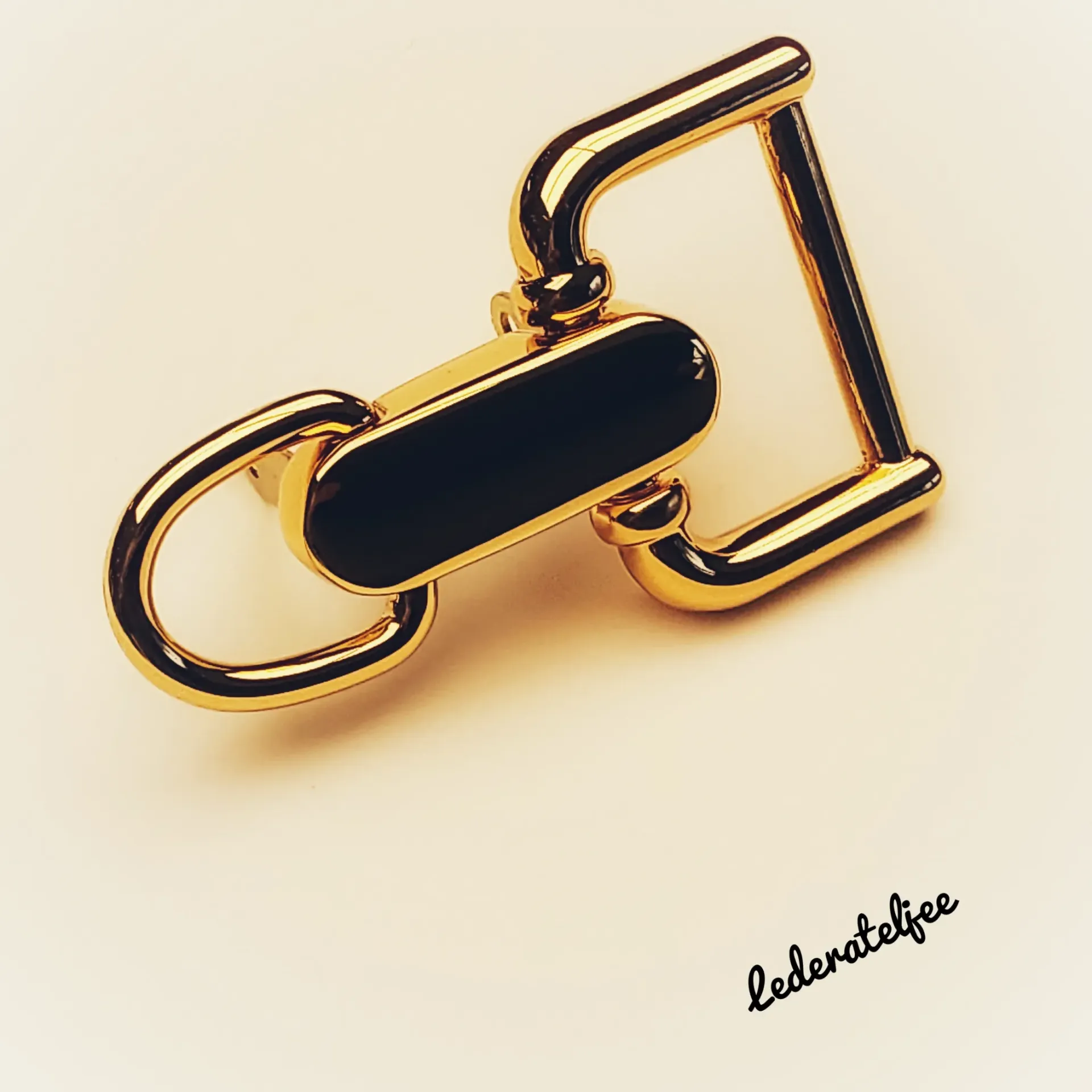 H163 Riembevestiging goud