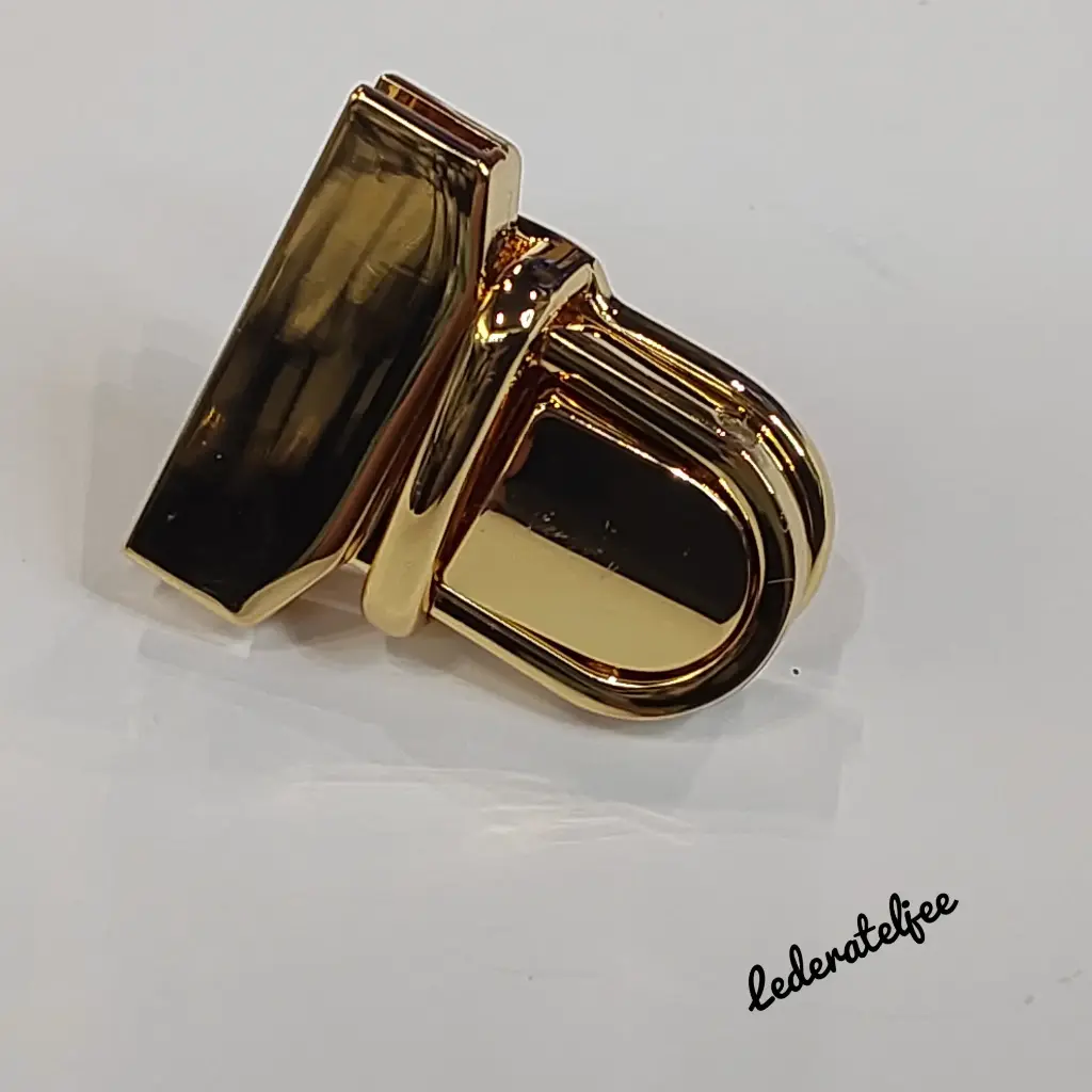 S108 Handtasslot Goud