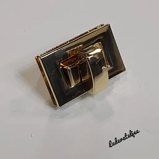 S05 Handtasslot Goud