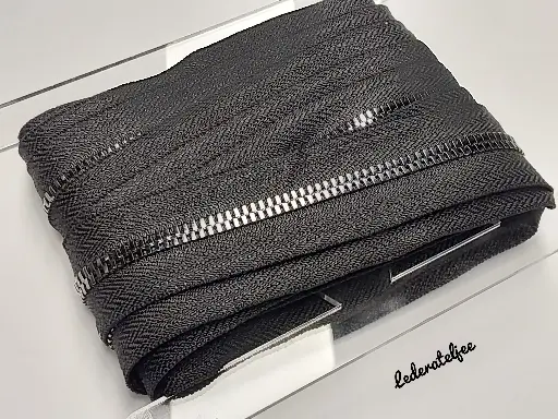 Metalen rits op rol met Gun Metal tandjes 5mm (geen YKK) 
