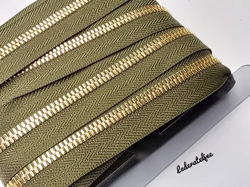 Rits YKK Excella 5 mm Gouden tandjes -verschillende kleuren